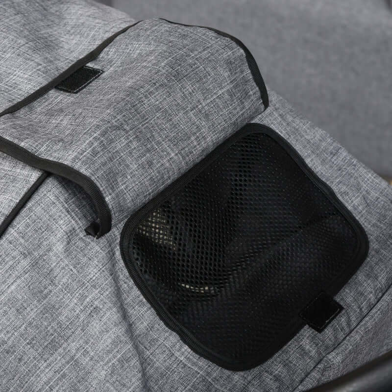 Travel Pet Stroller with Adjustable Handlebar featuring a storage bag and mesh window for ventilation.