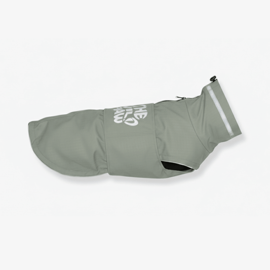 Wild Paw's WildGuard Rain Coat for Dogs in light green, designed for waterproof protection and comfort.