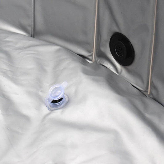 Close-up of the drain and valve in the Dog Foldable Pool Portable Swimming Pool, showcasing its waterproof design.