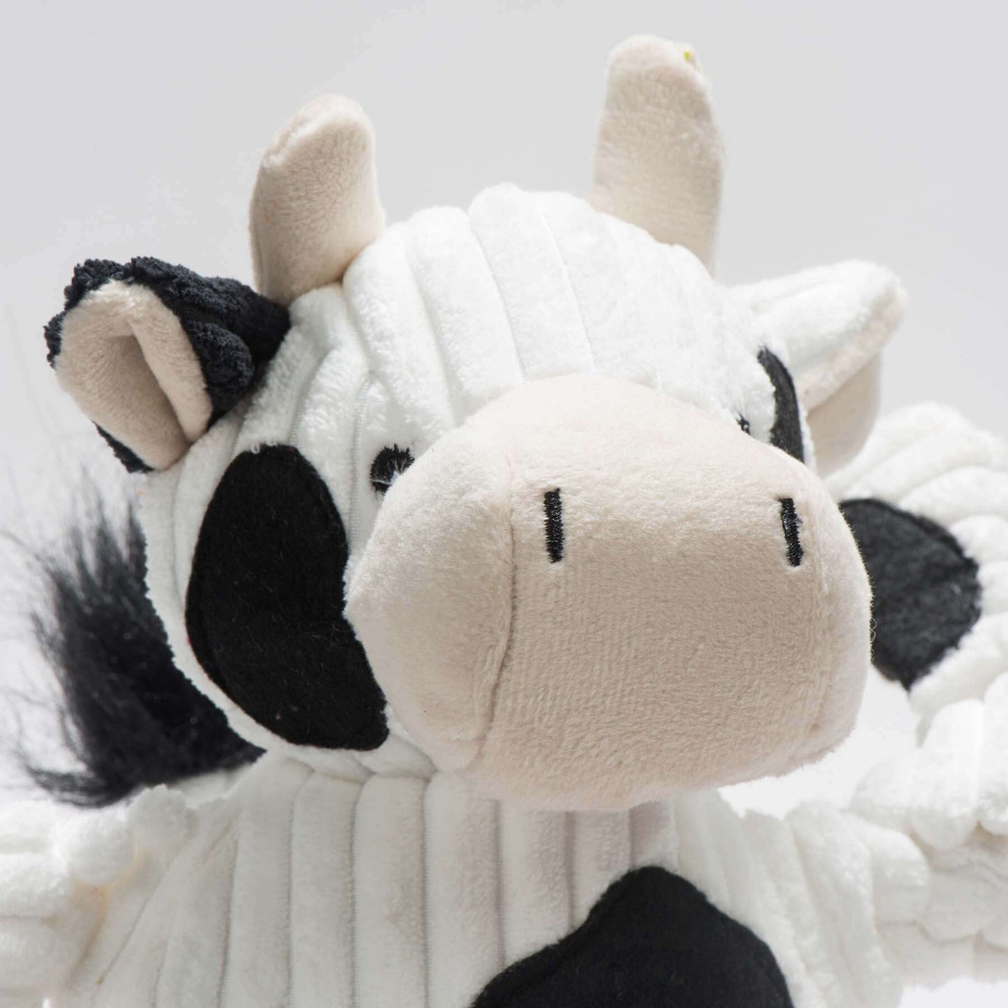 Dottie Cow Knottie Plush Dog Toy, a soft and durable plush dog toy designed for pets to enjoy.
