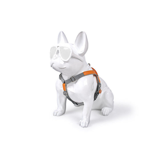 White dog statue wearing sunglasses and a Leather Dog Harness Leash Set, showcasing fashion and simplicity.