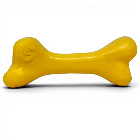 PUP-X Rubber Bone Dog Toy in bright yellow, a durable rubber dog chew toy ideal for large dogs and water play.