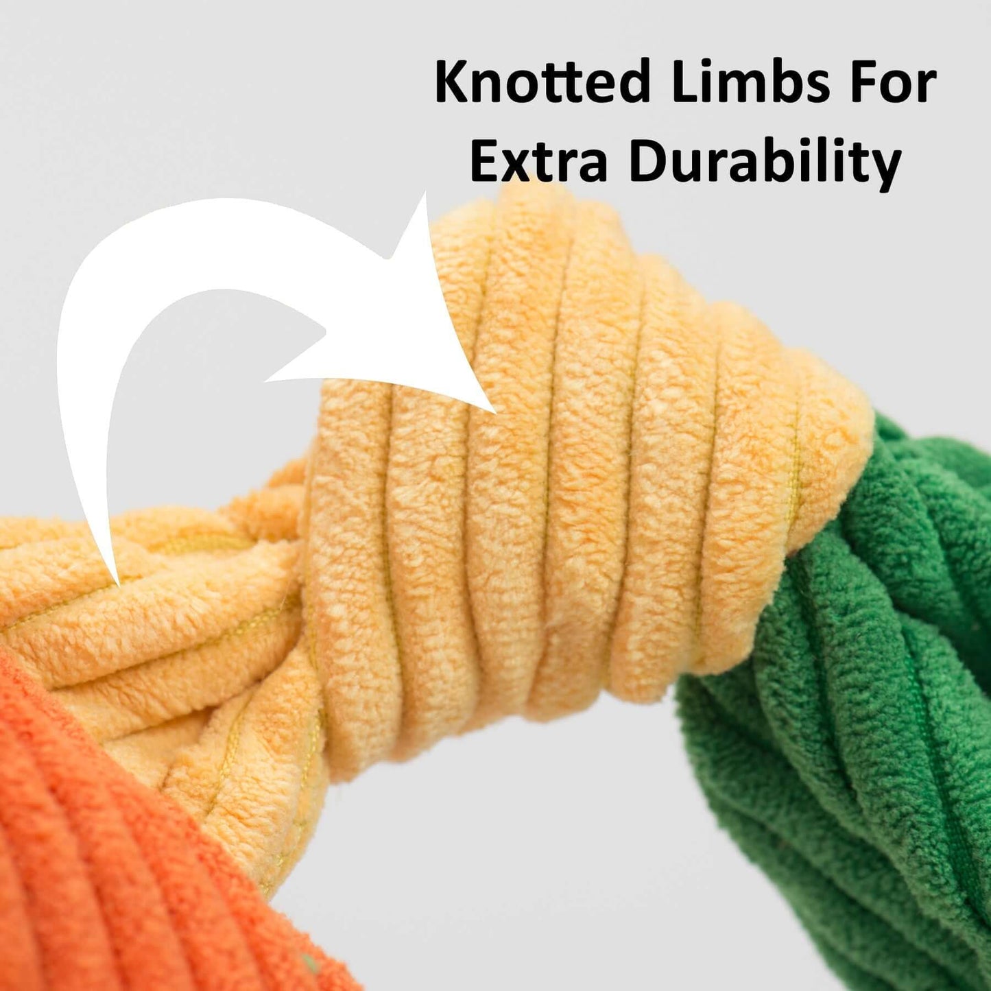 Knotted limbs of the Dottie Cow Knottie Plush Dog Toy for extra durability, showcasing the toy's strong construction.