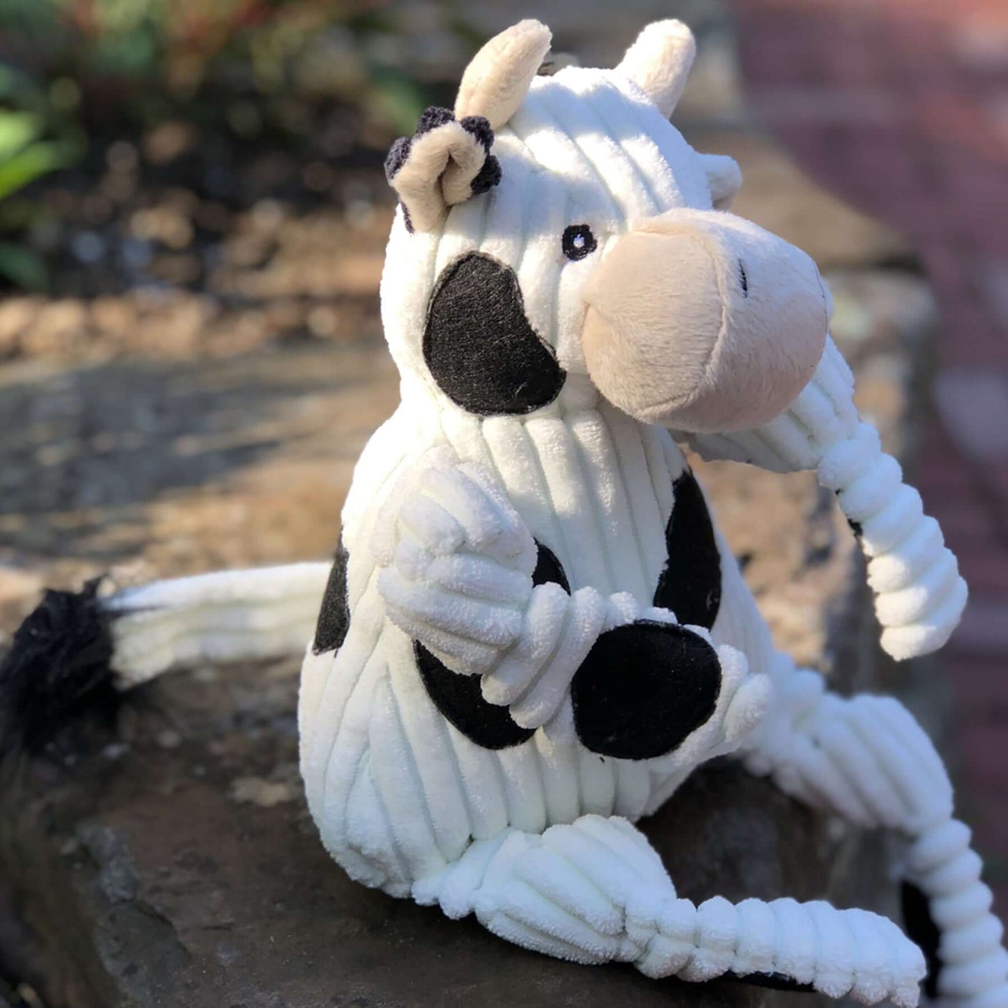 Dottie Cow Knottie Plush Dog Toy designed for durability and fun for dogs and puppies.