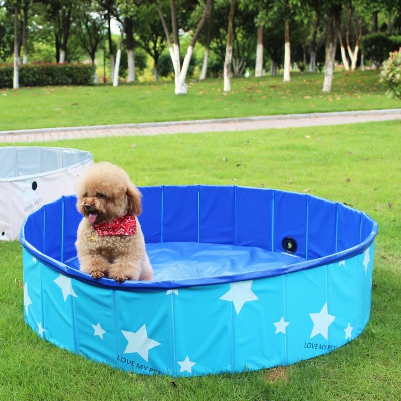 Dog Foldable Pool Portable Swimming Pool with a dog sitting inside on grass, ideal for pet bathing and splashing.